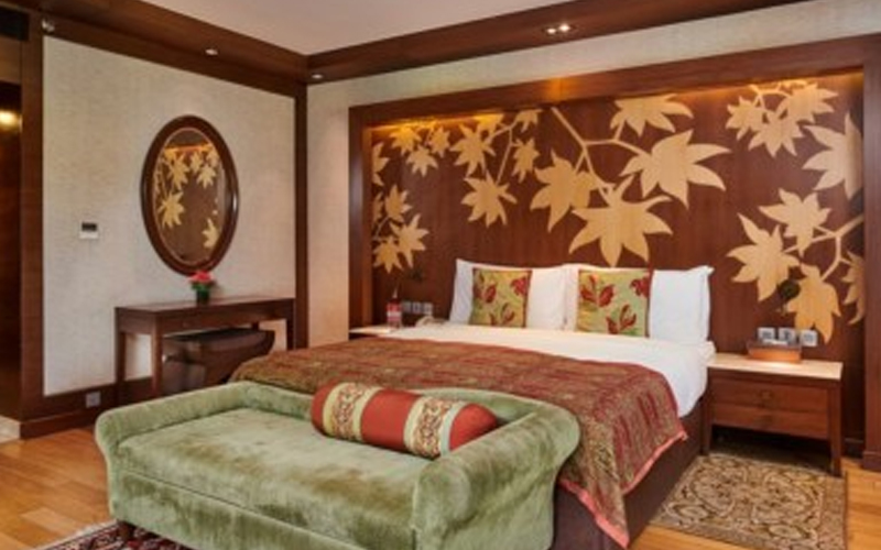 Luxury bedroom at The LaLiT Grand Palace Srinagar