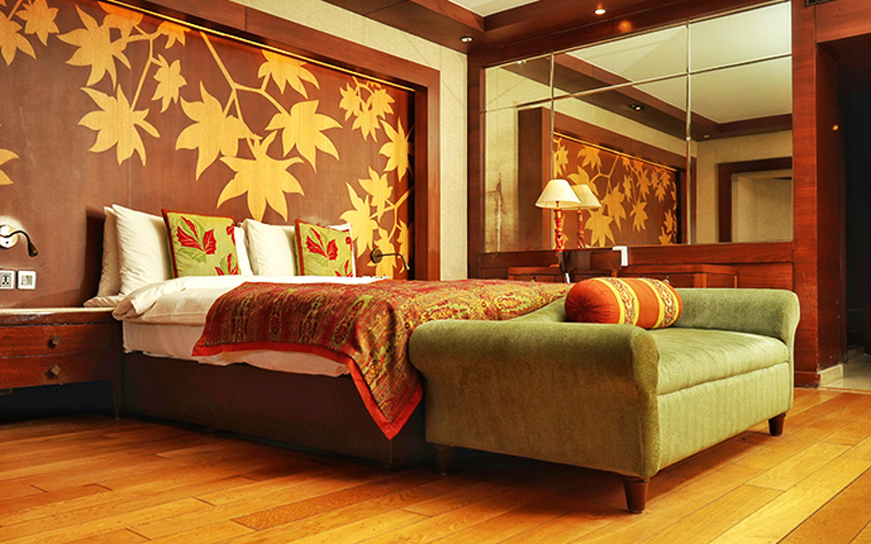 Elegant bedroom interior at The LaLiT Grand Palace Srinagar