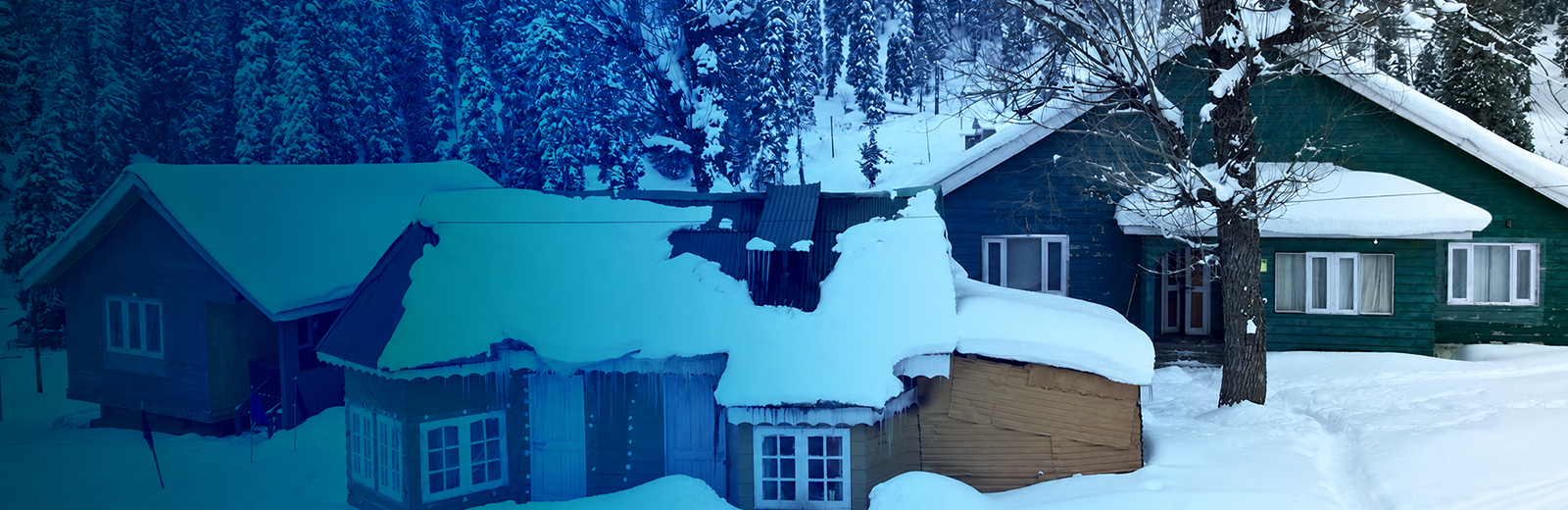 Snow-covered Kashmir mountain village